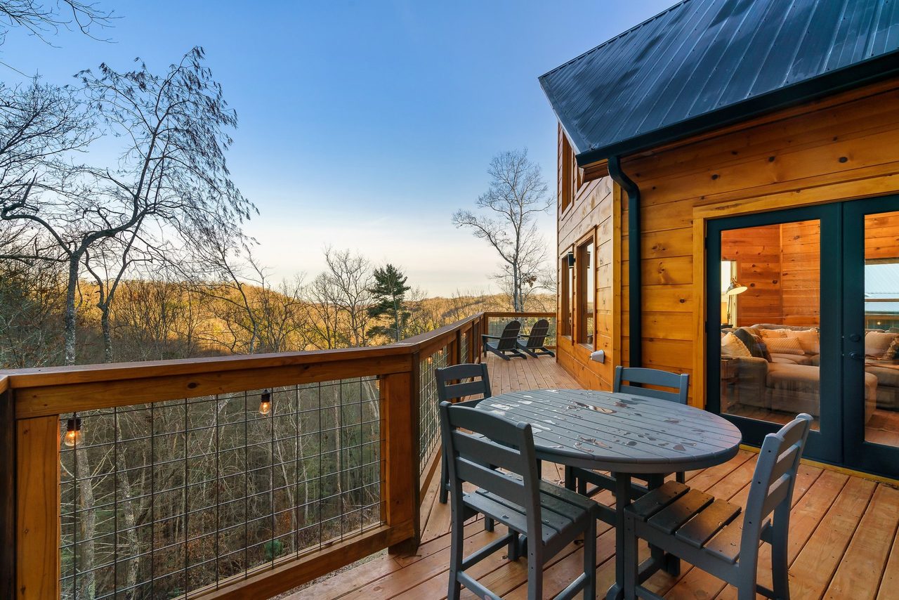 Gather around the outdoor table to dine or a game of cards!