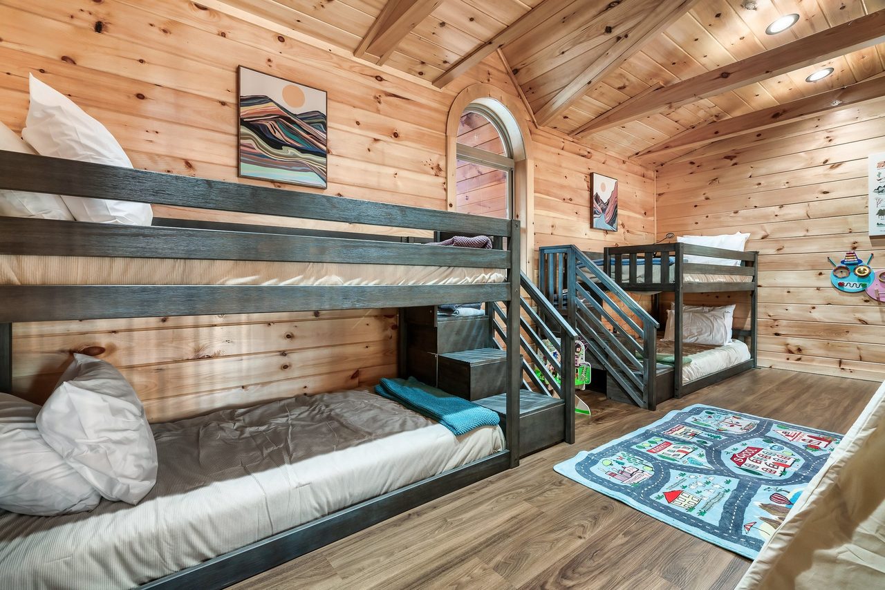 Upper level loft with 2 twin bunks and kids table